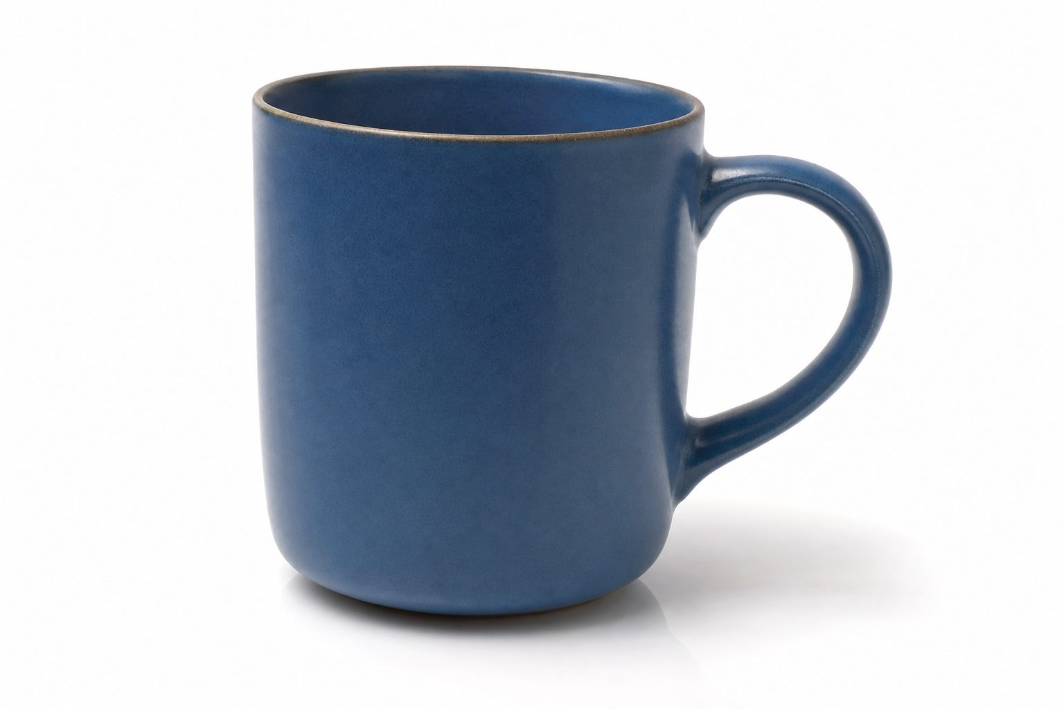 A blue ceramic mug on a clean white sweep, the kind of e-commerce product photo a store keeps organized and findable.